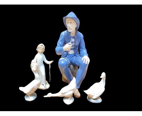 Impressive Nao porcelain figure - Fisherman smoking a pipe, together with three Nao geese and another Spanish figure (5)