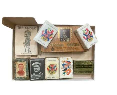Group of six First World War related matchbook covers, together with a First World War card game and related tins.