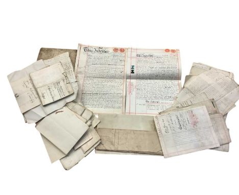 Large collection of 18th and 19th century indentures, deeds and other legal documents in a tin trunk