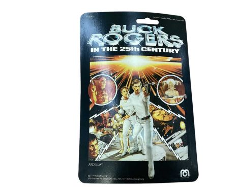 Collection of action figures in blister packs including Star Trek, Captain Scarlett, Lost, Austin Powers and others including