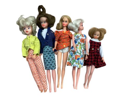 Group of vintage dolls, including Sindy, early Barbie (1966 Made in Japan) Tressy and Toots, etc, and an 'April Shower' doll 