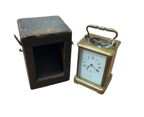 Brass carriage clock in case, retailed by Tanner, Cirencester, 14cm high