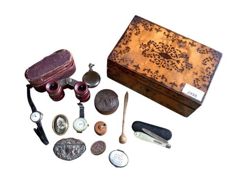 Group of sundries in an antique wooden box, including an 18th century enamel patch box, treen tape measure, etc