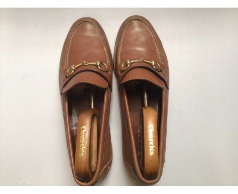 Gucci men's tan leather shoes Loafers with horse bit trim size 43 1/2, with a pair of Church's shoe trees.