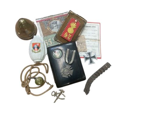 Group of First World War Militaria to include part of an Iron Cross, crested china mills bomb / grenade, Imperial German ciga