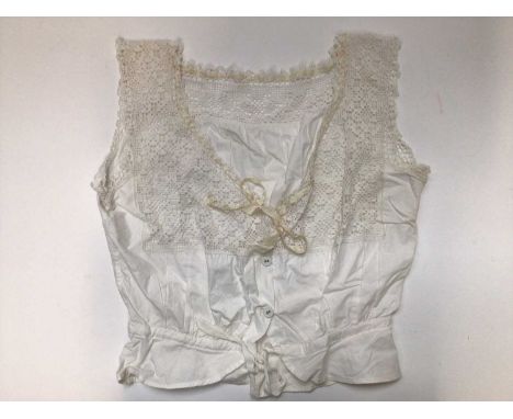 Group of Victorian / Edwardian babies white cotton clothing including open-back vests, christening gowns and dresses with lac