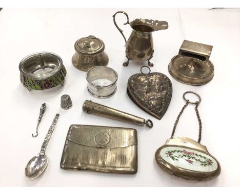 Group of silver items including an Edwardian enamelled purse, heart shaped desk clip, ink well, cream jug, cheroot holder, ca