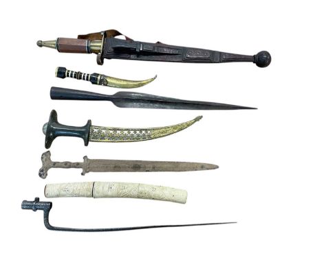 Old Arab Jamia dagger with horn hilt and pierced brass scabbard and lot ethnic weapons including a bronze dagger (7)