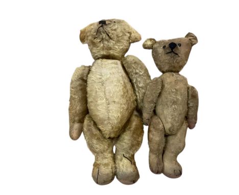 Large vintage teddy bear with glass eyes, stitched nose, hump back and long arms, together with another similar (2)