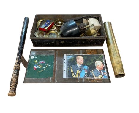 Collection of mixed militaria to include bullet casings, a truncheon, mess tins, and trench art items (1 box).