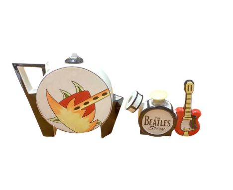 Lorna Bailey The Beatles drum kit teapot, 12,5cm high together with another teapot, 17.5cm high (2)