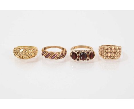 18ct gold bombé ring with leaf decoration, 9ct gold ruby set bombé ring, Victorian style 9ct gold garnet ring and a 9ct gold 