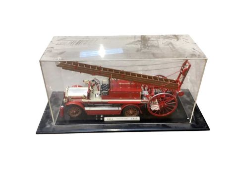 Collection of fire brigade memorabilia and related items, including a cased model of a 1914 Dennis fire engine, Coalport Fire