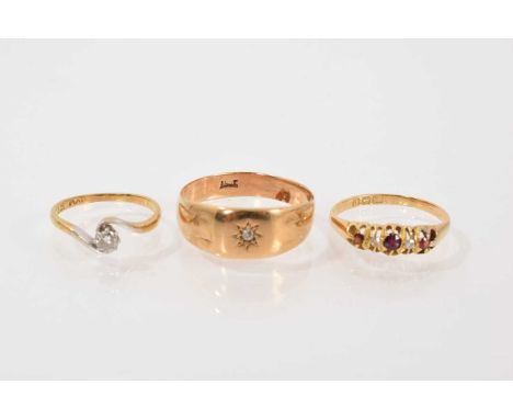 18ct gold diamond single stone cross over ring, size J, 18ct gold ruby and diamond five stone ring, size L½ and 18ct gold gen