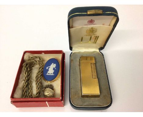 Dunhill gold plated lighter in original box, together with a Wedgwood brooch and a gold plated chain and locket
