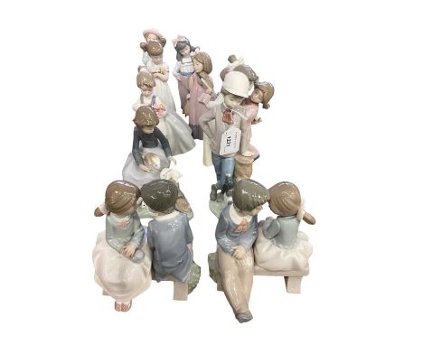 Group of ten Nao porcelain figurines and a Lladro porcelain figurine (11)