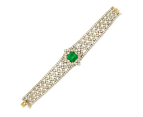 EMERALD AND DIAMOND BRACELETOf openwork design, the step-cut emerald within a surround of pear-shaped and marquise-cut diamon