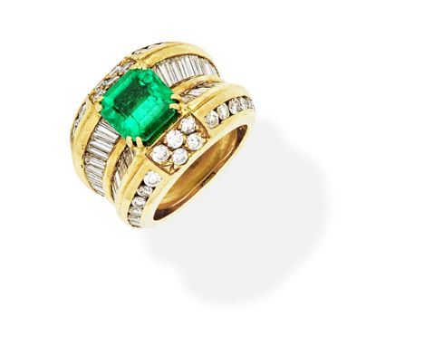 EMERALD AND DIAMOND RINGThe step-cut emerald, within a brilliant and baguette-cut diamond surround, diamonds approx. 3.20cts 