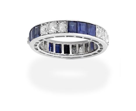 SAPPHIRE AND DIAMOND ETERNITY RINGDesigned as an alternating series of step-cut sapphires and old brilliant-cut diamonds, dia