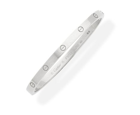 CARTIER: LOVE BANGLEThe 18 carat white gold bangle with screwhead motifs,  signed Cartier, numbered, maker's mark, Swiss make