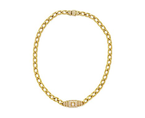 CHAUMET: DIAMOND-SET NECKLACE, 1982The frontispiece of geometric design set with a step-cut diamond within a tiered surround 