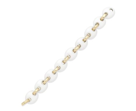 KOENIG: CERAMIC BRACELETDesigned as a series of alternating white ceramic and polished links, signed Koenig,  length 19.5cmFo