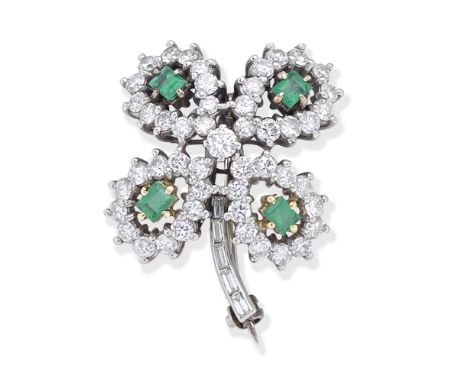 EMERALD AND DIAMOND FOUR LEAF CLOVER BROOCHEach leaf set with a step-cut emerald and brilliant-cut diamonds, the stem set wit