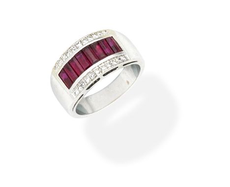 RUBY AND DIAMOND RINGThe step-cut rubies, between two rows of single-cut diamonds, ring size approx. NFor further information