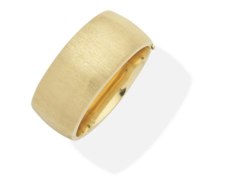BANGLEOf fine line engine turned finish, engraved Margaret to the inner band,  inner circumference approx. 17.8cmFor further 