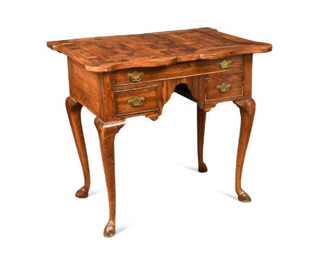 A parquetry lowboy, 19th century, the shaped top above three drawers above a shaped apron raised on cabriole legs with hoof f