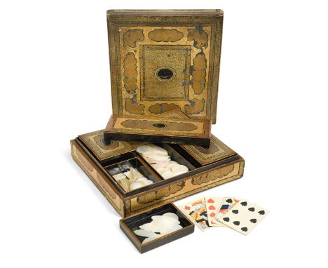 A Chinese export gold and black lacquer games box, Qing Dynasty, circa 1800, the cover with central rectangular reserve withi