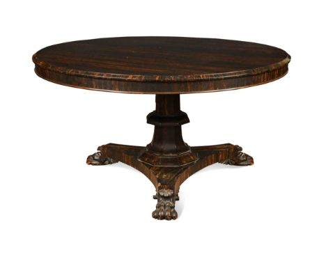 A William IV calamander breakfast table,  the tapering octagonal column on a triform base with lion paw feet75 x 137cm Proven