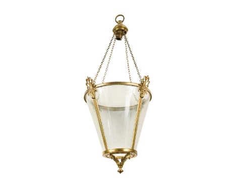 A gilt brass conical shaped hanging lantern, 20th century,  decorated with rams' heads surmounted by a honeysuckle62cm full h