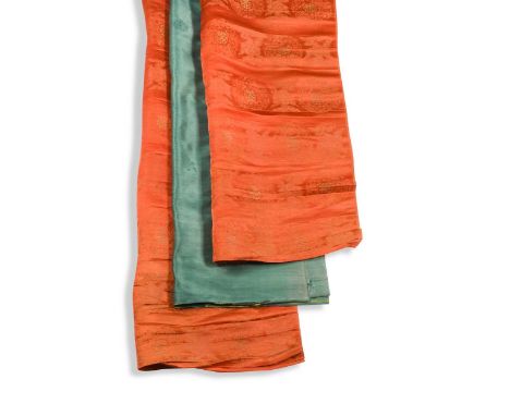 Two rolls of Chinese ornamental silk with gold-wrapped thread detail, late Qing Dynasty circa 1900,  red worked brocade with 