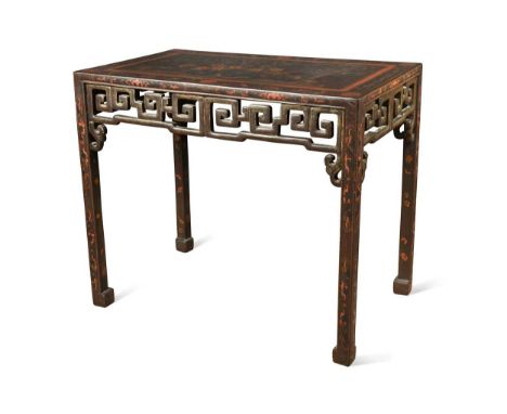 A Chinese Export black lacquer side table, 19th century, decorated to the top with flowering shrubs and birds, pierced angled
