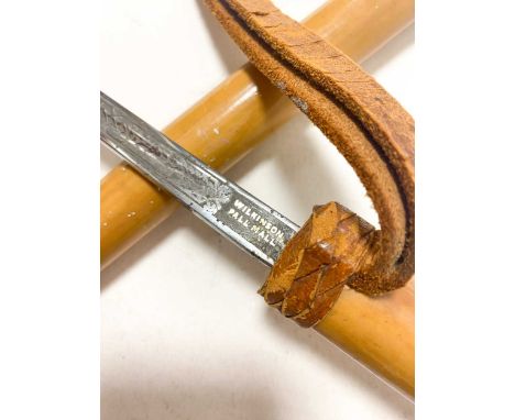 A sword stick or baton by James Smith & Sons, New Oxford Street, early 20th century, the bamboo handle and scabbard concealin