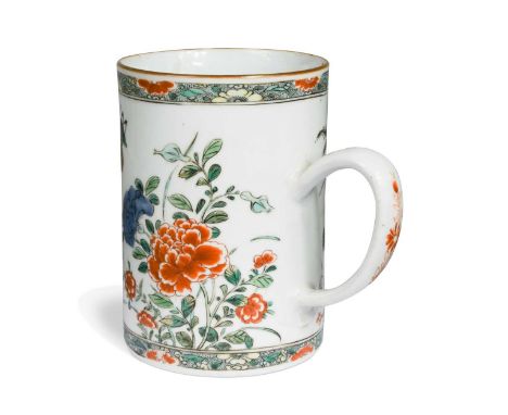 A Chinese famille verte pint mug, Kangxi (1662 - 1722), painted with a cricket amongst peony blossoms and grasses15cm high x 