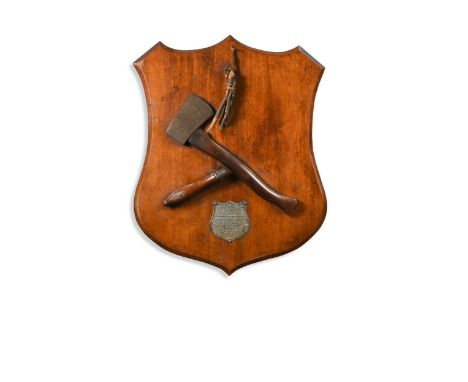 A presentation hatchet and billhook handle, circa 1890,  mounted to a mahogany shield with applied silver shield  engraved 'H