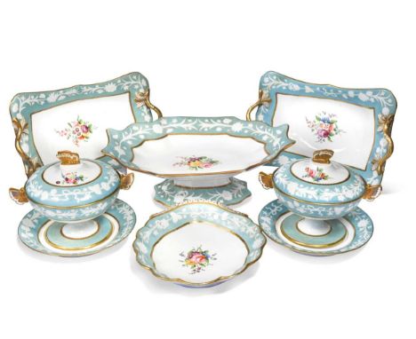 A Spode dessert service, pattern 3393, circa 1820, painted to the centres with a floral spray, the blue ground borders moulde