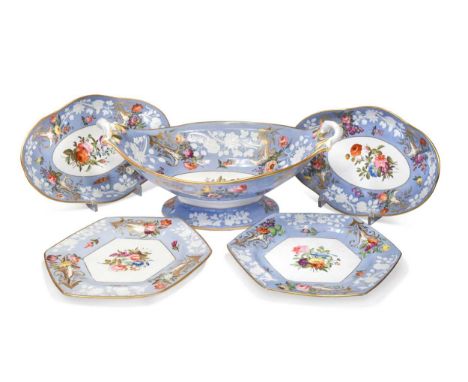 A Spode composed dessert and tea service, circa 1815, painted to the centres with a floral spray, within broad light blue bor