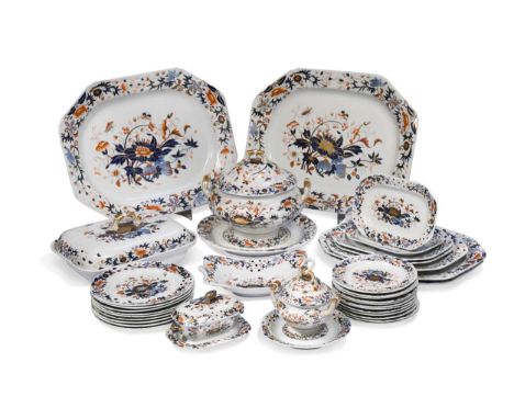 A Spode New Stone dinner service, circa 1810, decorated with the ‘Bang-Up’ pattern of oriental flowers in imari colours, comp