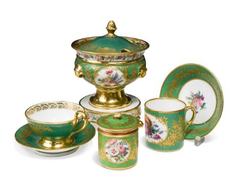 A Paris porcelain service, late 19th century,  the green ground bodies gilt with trailing foliage and reserved with floral pa