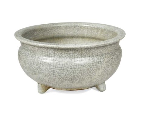 An Oriental Guan type crackle-glazed tripod censer bowl, late 19th century, 13.5cm high x 27cm diameterGood overall condition