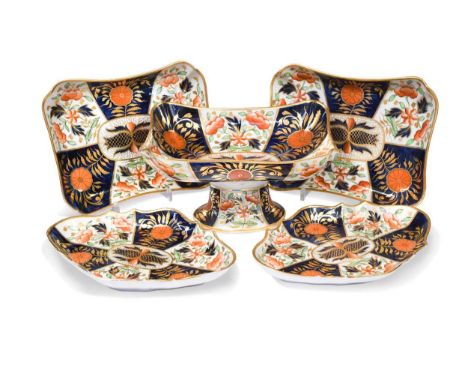 An English porcelain imari dessert service, circa 1810, decorated with panels of flowers and foliage with alternating white a