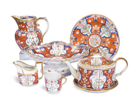 An assortment of Spode and Coalport porcelain, circa 1800-05, decorated in the so-called Dollar pattern, comprising two teapo