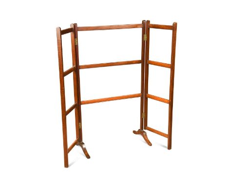 A large-scale mahogany folding towel horse, late 19th century, the centre section with three rails, the hinged sides with fou