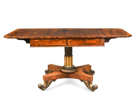 A William IV rosewood sofa table, the rectangular crossbanded drop flap top above two frieze drawers raised on a part gilt co