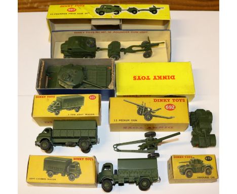 6 Dinky military vehicles. 670 Armoured car. 692 medium gun. 651 Centurion tank. 621 3-ton army truck. 623 Army covered wagon