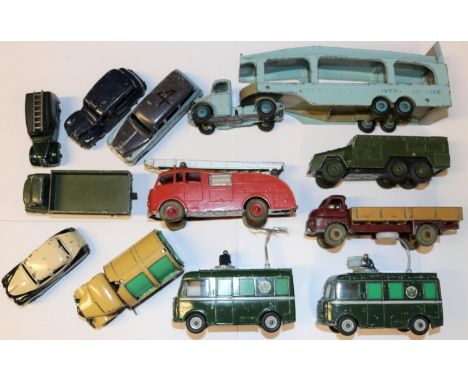 12 Dinky Toys. Including; Bedford Pullmore car transporter. 2x BBC roving eye camera vans. Big Bedford wagon. Austin Somerset