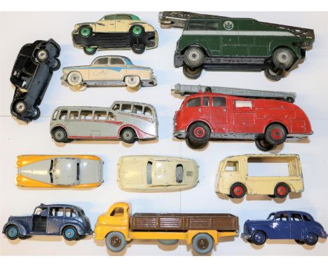 12 Dinky Toys. Including; Jaguar XK120. BBC extending mast vehicle. Express Dairy milk float. 2x Austin Taxi., Morris Oxford.